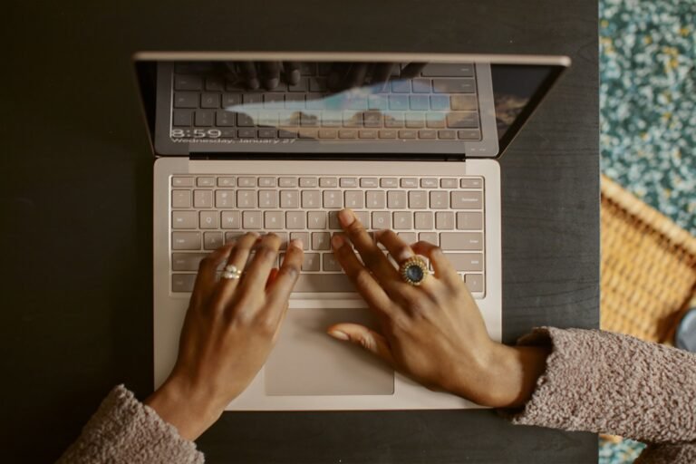 Person using a laptop while reviewing website performance and Core Web Vitals